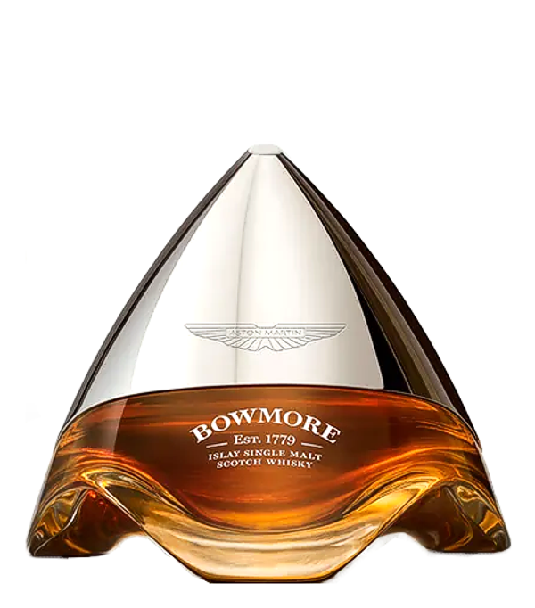 Bowmore ARC-54 Aston Martin 54 Years Old 1968, 70 cl, 44.3 % Vol. (Whisky), Schottland, Isle of Islay, Der Bowmore ARC-54 ist ein exklusiver 54 Jahre alter Single Malt Whisky aus dem Jahr 1968, entstanden in Zusammenarbeit mit Aston Martin. Gereift in Sherry- und amerikanischer Eiche, bietet er komplexe Aromen von dunkler Schokolade, Trockenfrchten und einem Hauch Rauch. Das Design der Flasche verbindet handwerkliche Perfektion mit futuristischer Eleganz. Mit nur 130 Flaschen weltweit zhlt er zu den seltensten Whiskys von Bowmore  ein Meisterwerk fr Sammler und Geniesser.  <strong>Wie schmeck